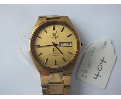 Gents OMEGA Seamaster quartz wrist watch with seconds sweep and day and date aperture on metal strap
