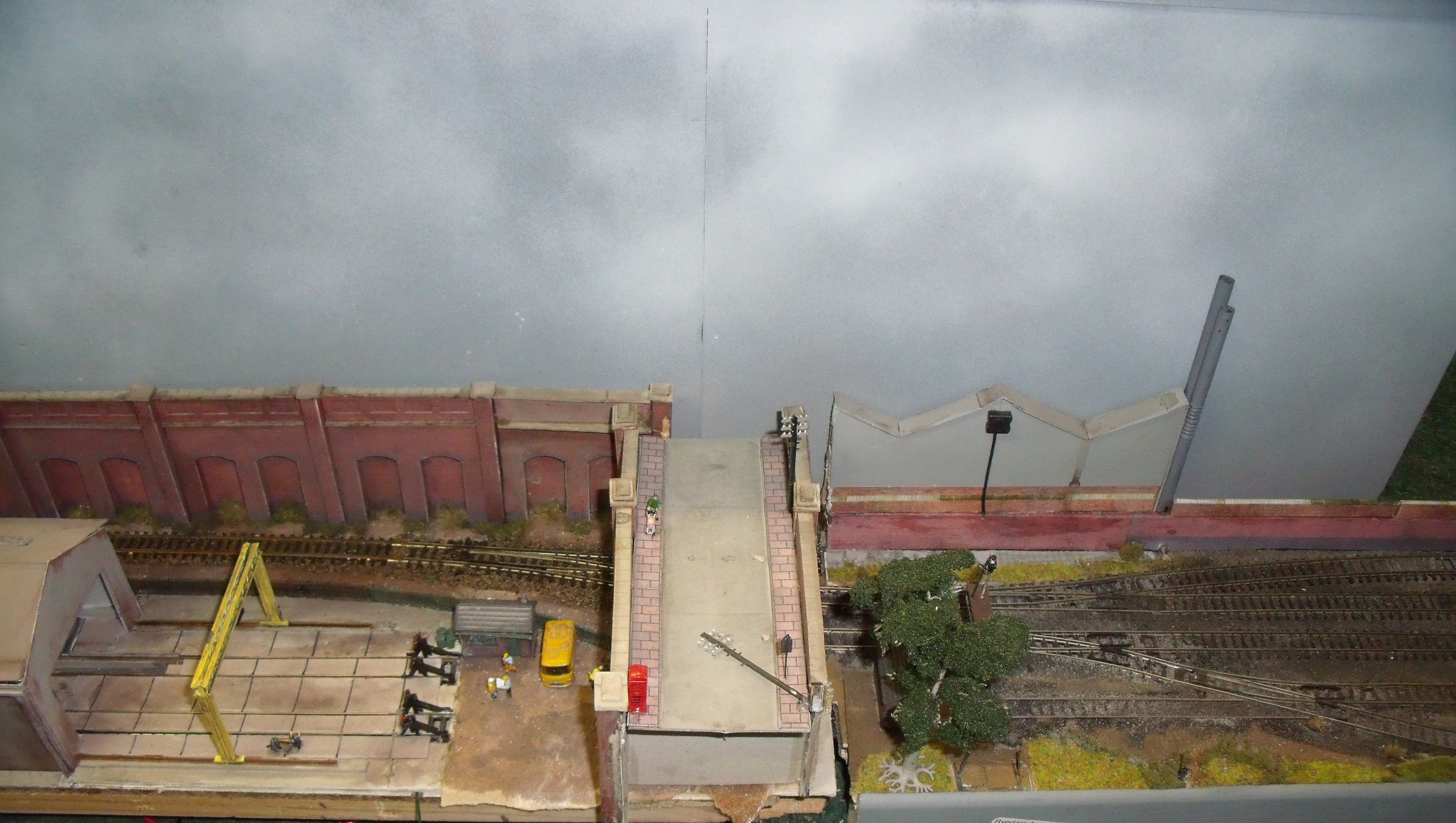 N gauge end to end model railway layout with four lines, card scenic's etc (in three sections 122