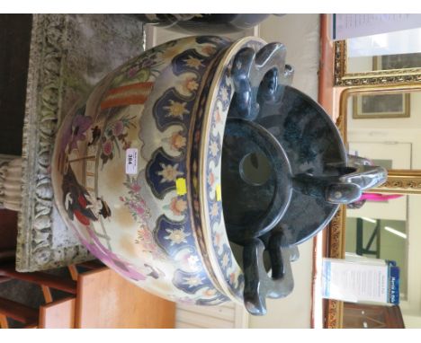 A large Japanese ceramic fish bowl or jardiniere depicting ladies at leisure on a balcony 55cm diameter, 46cm high on a hardw
