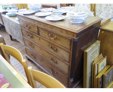 A George III crossbanded mahogany chest of drawers, the rectangular top with moulded edge over two short and three long gradu