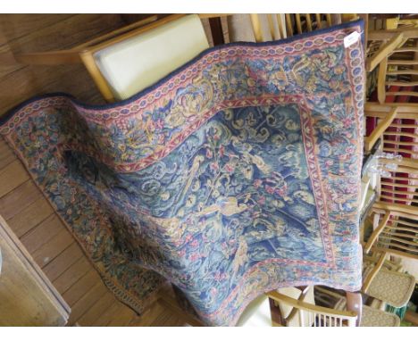 A French tapestry depicting birds in foliage within a floral border of urns and musicians 165cm x 127cm
