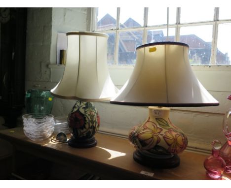 A Moorcroft Poppy design baluster table lamp, ref. L717, with paper label 22cm high, and a Honeysuckle design squat baluster 