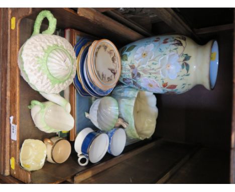 A Belleek three piece tea service of shell form, some damage, various other teawares, vases, clock and books