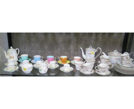 A Heathcote china Tulip pattern coffee service, a set of five polychrome Royal Grafton coffee cups and a Noritake tea and cof