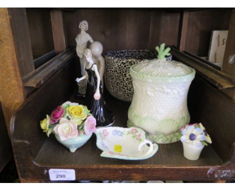 A Belleek style shell shape biscuit barrel 19cm high, a Royal Worcester figure and other ornaments