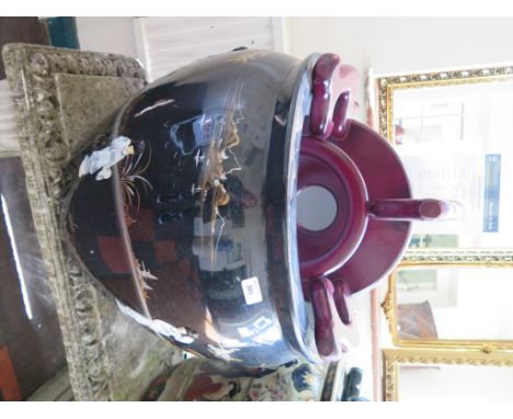 A large Japanese ceramic fish bowl or jardiniere depicting relief ladies in a garden on a grey ground 55cm diameter, 46cm hig