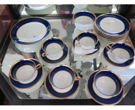 An Anchor china blue and gilt tea service for six place settings, lacks teapot and milk jug