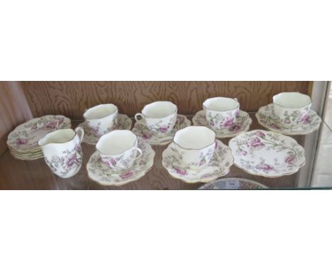 A Coalport floral design part tea service for six place settings, lacks teapot