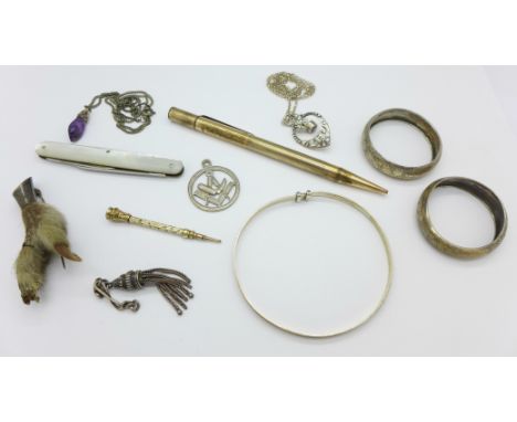 A silver bangle, penknife, gilt metal pencil, a Victorian silver Masonic fob, claw brooch, etc.