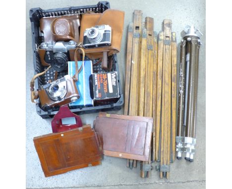 Cameras including Kodak, Zenit, camera lens and two tripods, etc.