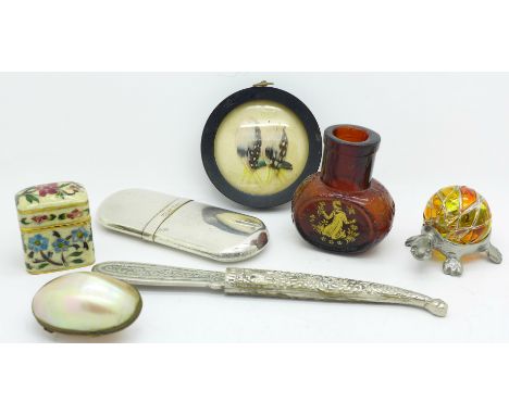 A 'Silver Flame' lighter, an inlaid cloisonne pot, mother of pearl box, white metal and glass tortoise, plated letter opener,