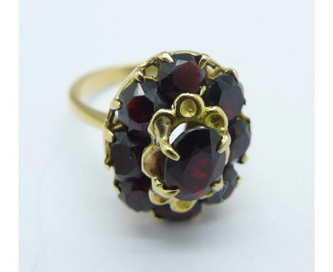 A yellow metal and garnet ring, shank a/f, 5.2g, M