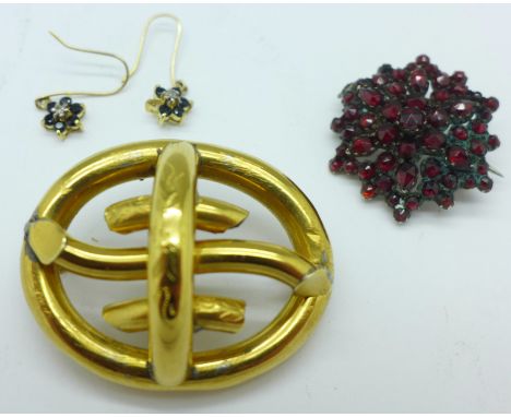 A Bohemian garnet brooch, a c.1900 brooch and a pair of 9ct gold cluster earrings, lacking one stone