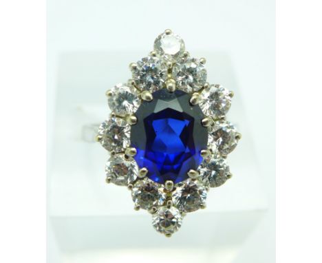 A 9ct gold, blue stone and diamond simulants cluster ring, 5.6g, V