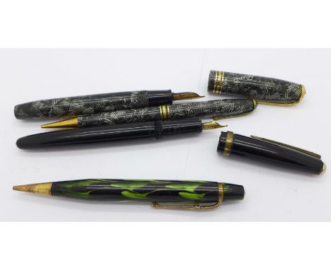 A Conway Stewart 58 pen with 14ct gold nib, a/f, one other pen and two pencils