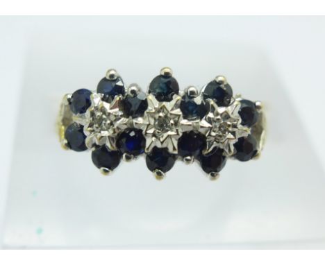 A 9ct gold triple cluster ring, 2.5g, N