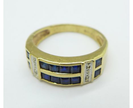 A 9ct gold, blue and white stone ring, 2.9g, L