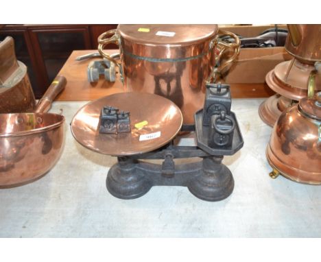 A set of kitchen scales and weights