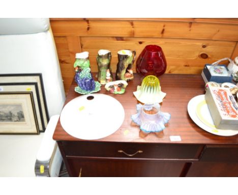 Three glass light shades; a collection of East Gate ornaments etc