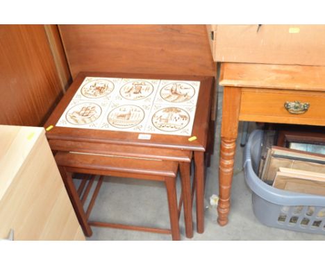 A nest of tile topped tables