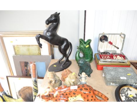 A Villeroy &amp; Boch model of a horse; a gurgling jug; a pair of carved stone bookends etc