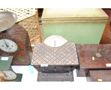 A set of cast iron floor scales with enamel dial to weight 20 stone