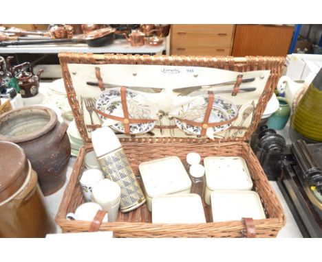 A Coracle wicker picnic hamper and contents