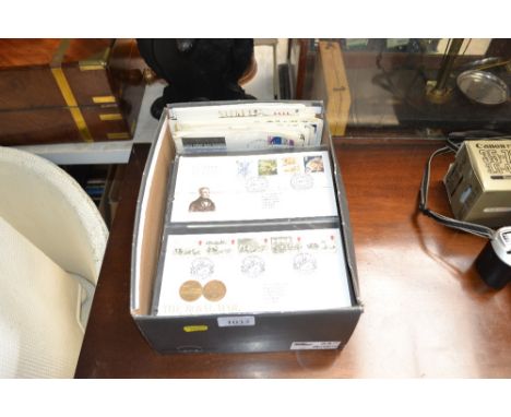 A box containing various Great British First Day covers