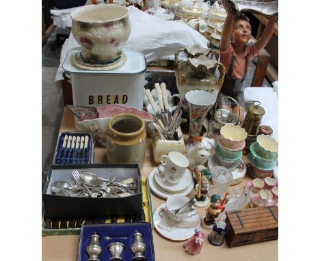 A plaster figure of a boy, together with Royal Winton dishes, miners lamps, flatwares, cruet set, bread bin, Hummel figures, 