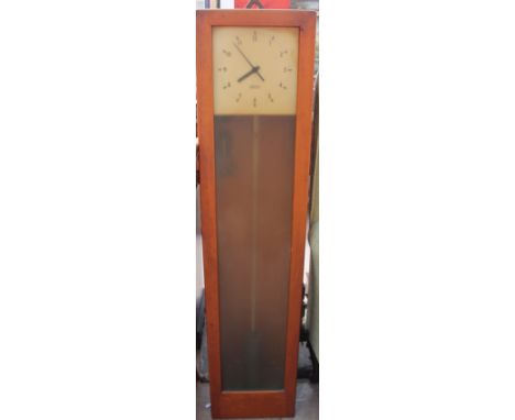 A Gents electric wall clock, with a glazed door, square dial and Arabic numerals