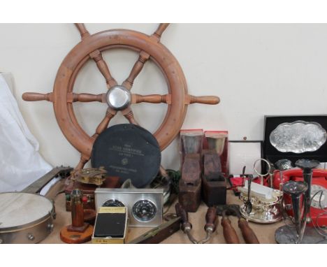 A small ships wheel, together with a banjo, Rude Star IdentifierA-N Type 1, reproduction pocket compass, wood working planes,