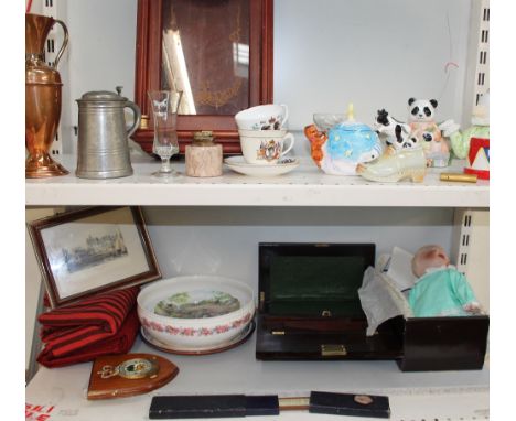 A modern wall clock together with novelty tea pots, a laptop desk, slide rule etc