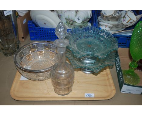 A silver plated rimmed fruit Bowl, two cake stands with chrome bases and a Decanter