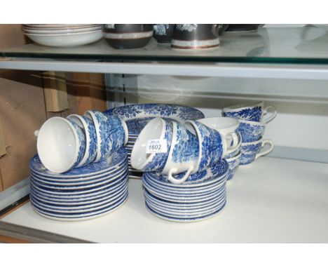 A quantity of blue and white 'English Broadhurst' tableware including twelve cups and saucers, twelve side plates and twelve 