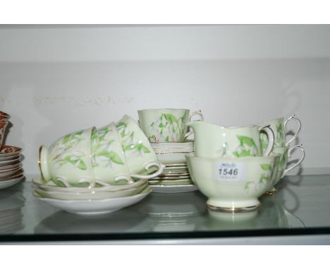 A Royal Albert Teaset in the 'Laurentian Snowdrop' pattern comprising six cups and saucers, six tea plates, sandwich plate, j