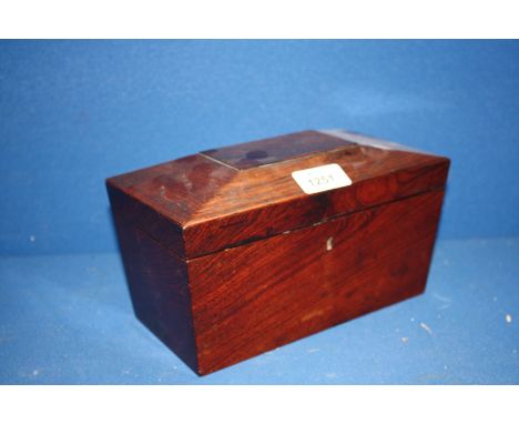A Rosewood Tea Caddy, a/f, 5 1/4'' tall x 9'' long x 5 1/2'' wide.