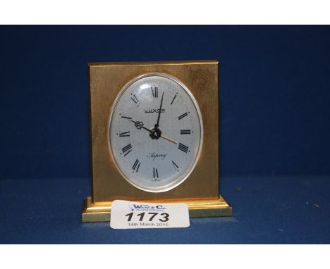 A small brass 'Luxor' Alarm Clock by Asprey.  3'' tall