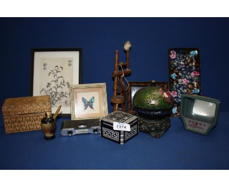 A quantity of miscellanea to include a pair of folding field glasses, papier mache lidded pot, carved wooden playing card box