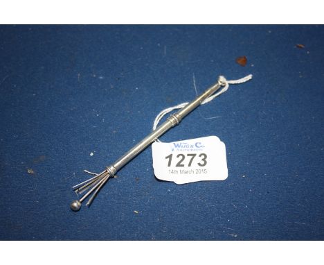 A Silver swizzle Stick