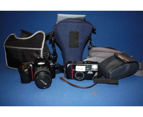 Two Nikon film Cameras (F50 and TWzoom) and three camera Bags