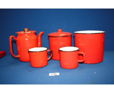 A Red Enamel teapot, two mugs and two storage containers.