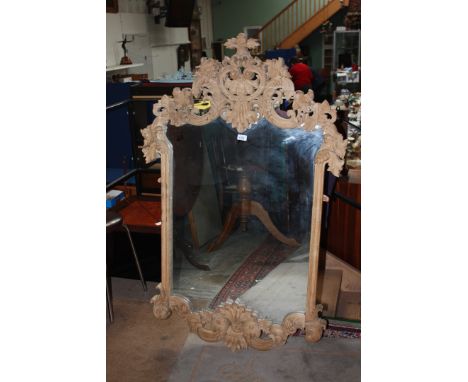 A large carved light oak Mirror with acorn and oak leaf design.