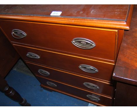 A reproduction light Mahogany finished flight of four drawers with bull nose moulded top, flight of four cock beaded edge dra