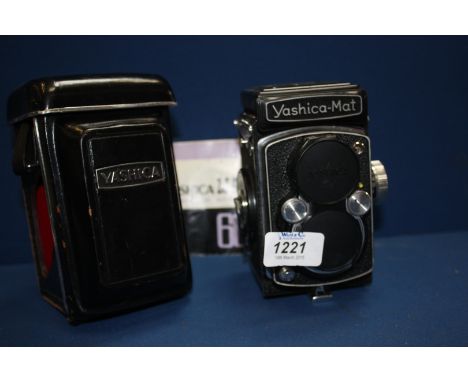 A Yashica-Mat 66 Twin Lens Reflex Camera having a Yashinon 80mm f/3.5 Lens serial no. MT1030727, with original Case, Lens Cap