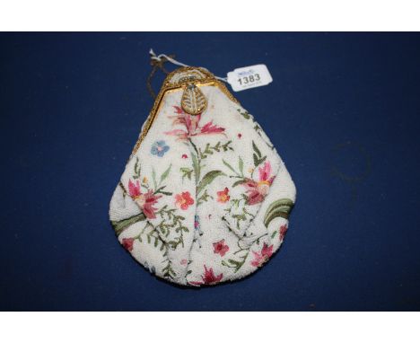 A French art deco beaded Purse with enamel clasp.