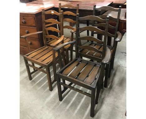 A set of four Ercol Golden Dawn elm dining chairs 