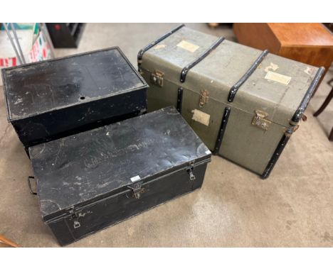 An early 20th Century steamer trunk and two metal trunks 