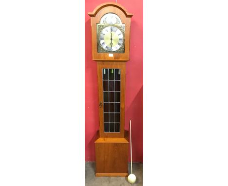 A teak longcase clock 