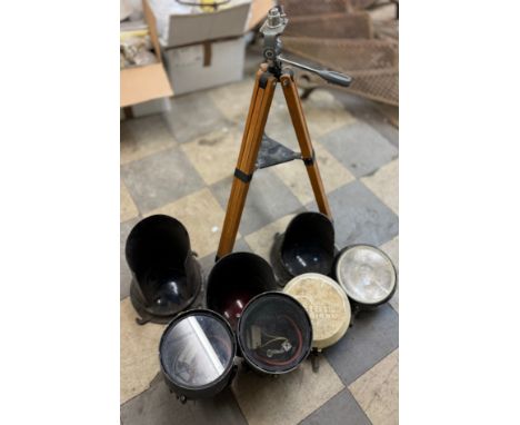 Assorted spotlights and car lights, including Cibie and a Vlbon tripod stand