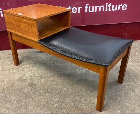 A teak telephone seat 